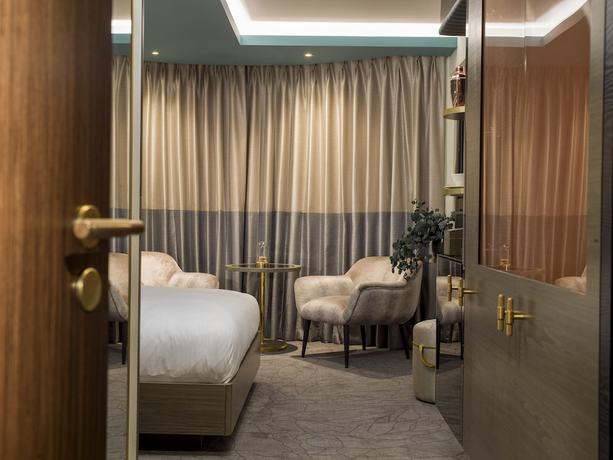 Imagen de la habitación del Hotel Middle Eight. Foto 16