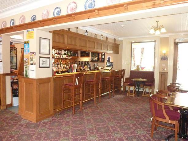 Imagen del bar/restaurante del Hotel Middle House. Foto 6