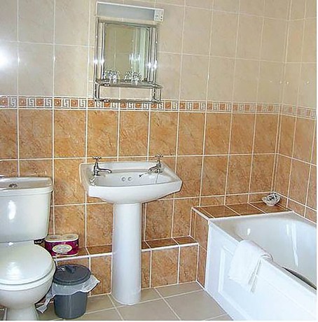 Imagen de la habitación del Hotel Middle House. Foto 13