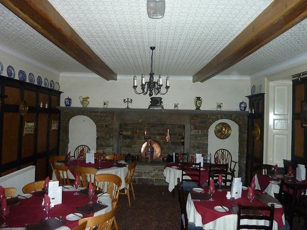 Imagen del bar/restaurante del Hotel Middle House. Foto 9