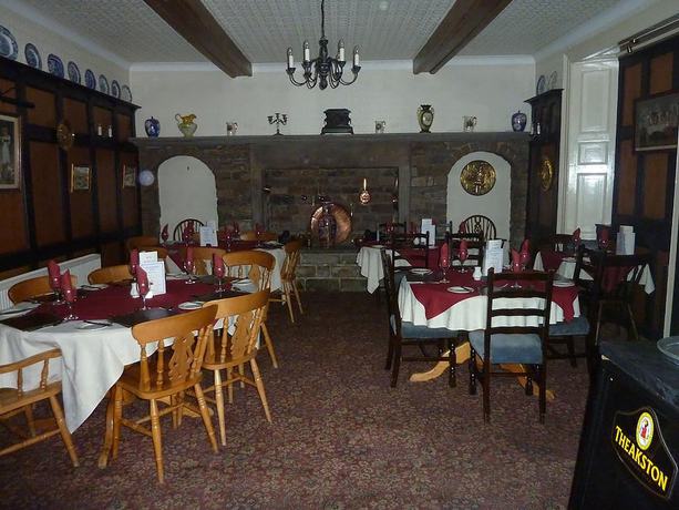 Imagen del bar/restaurante del Hotel Middle House. Foto 10