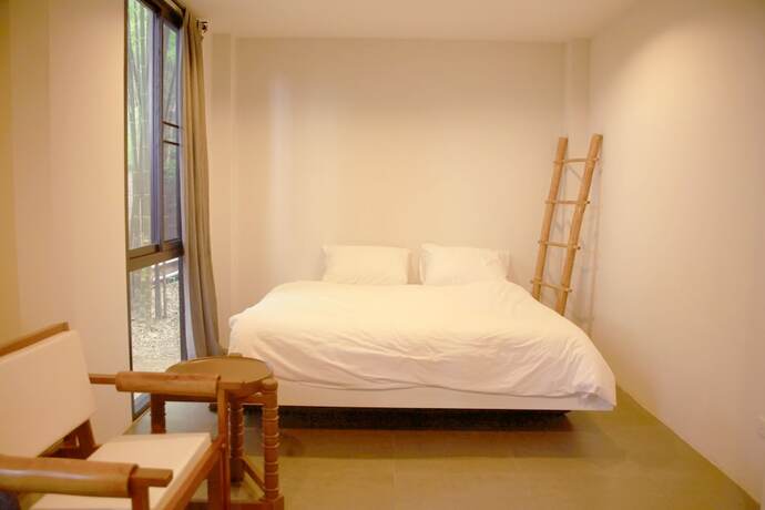 Imagen de la habitación del Hotel Middle Path Retreat. Foto 19