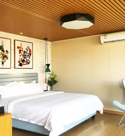 Imagen de la habitación del Hotel Midea Egret Lake Car Camp. Foto 3