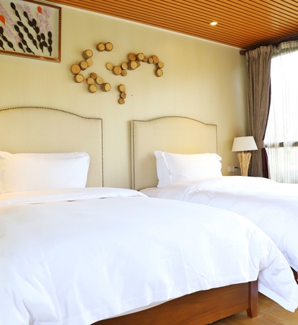 Imagen de la habitación del Hotel Midea Egret Lake Car Camp. Foto 9