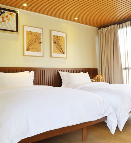 Imagen de la habitación del Hotel Midea Egret Lake Car Camp. Foto 10