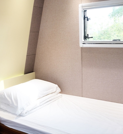 Imagen de la habitación del Hotel Midea Egret Lake Car Camp. Foto 12