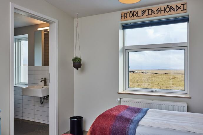 Imagen de la habitación del Hotel Midgard Base Camp. Foto 22