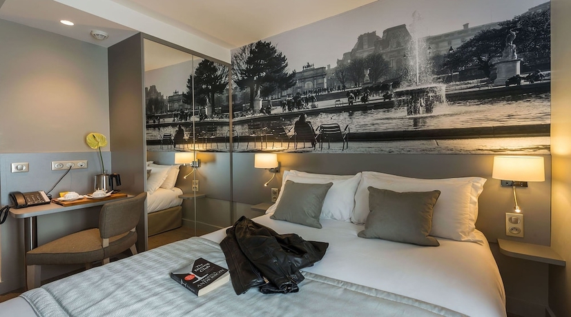 Imagen de la habitación del Hotel Midnight Paris. Foto 3