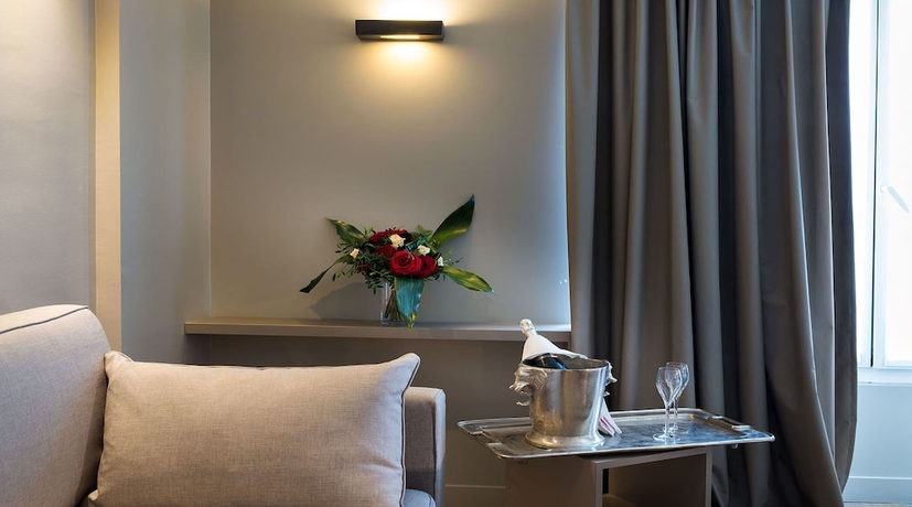 Imagen de la habitación del Hotel Midnight Paris. Foto 4