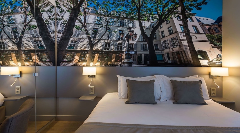 Imagen de la habitación del Hotel Midnight Paris. Foto 5