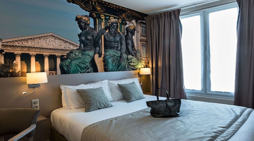 Imagen de la habitación del Hotel Midnight Paris. Foto 6