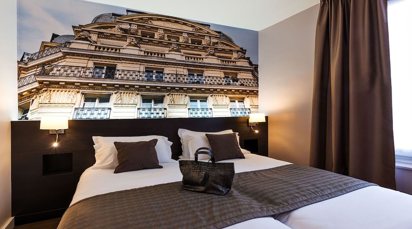 Imagen de la habitación del Hotel Midnight Paris. Foto 9