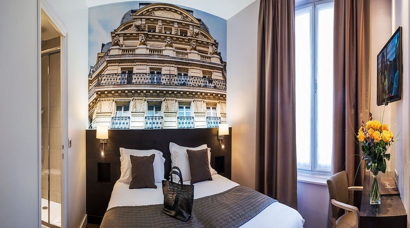 Imagen de la habitación del Hotel Midnight Paris. Foto 10