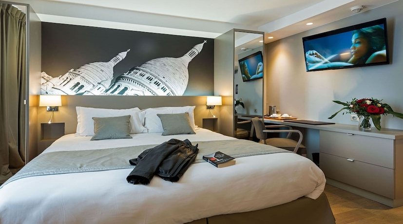 Imagen de la habitación del Hotel Midnight Paris. Foto 15