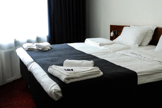 Imagen de la habitación del Hotel Midpoint Helsinki. Foto 8