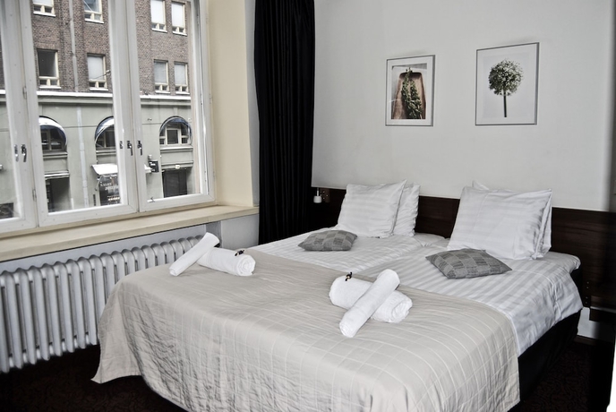 Imagen de la habitación del Hotel Midpoint Helsinki. Foto 12