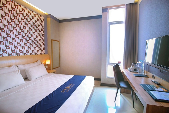 Imagen de la habitación del Hotel Midtown Express Demangan Yogyakarta. Foto 2
