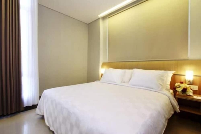 Imagen de la habitación del Hotel Midtown Express Demangan Yogyakarta. Foto 5