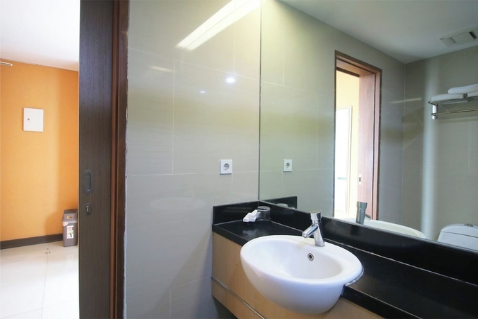 Imagen de la habitación del Hotel Midtown Express Demangan Yogyakarta. Foto 11