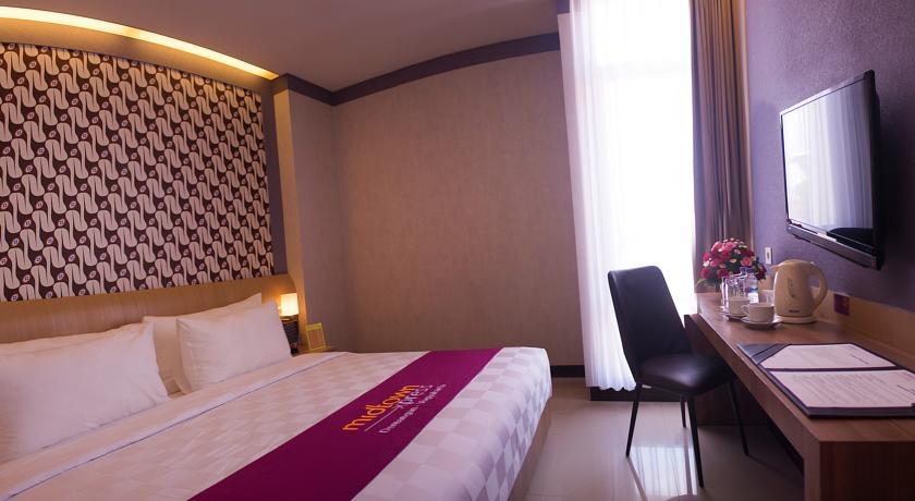 Imagen de la habitación del Hotel Midtown Express Demangan Yogyakarta. Foto 1
