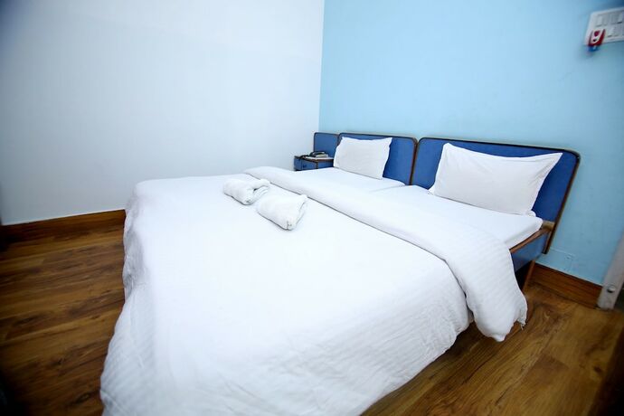 Imagen de la habitación del Hotel Midtown, Haridwar. Foto 17