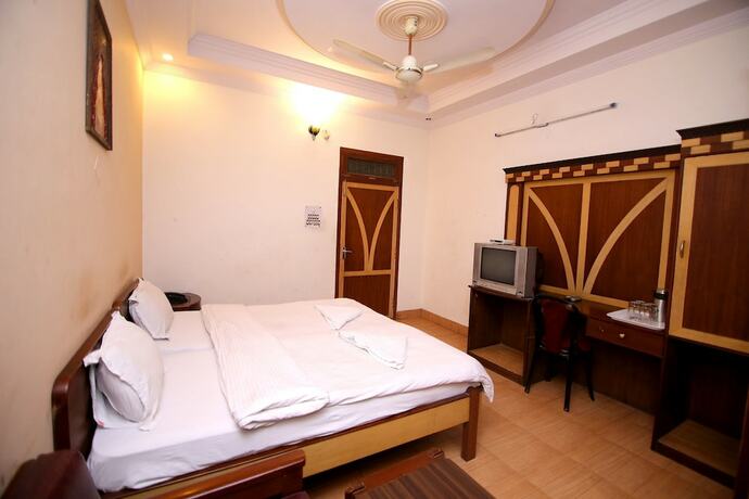 Imagen de la habitación del Hotel Midtown, Haridwar. Foto 19