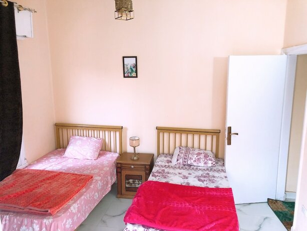 Imagen de la habitación del Hotel Midtown Homes and studios. Foto 20