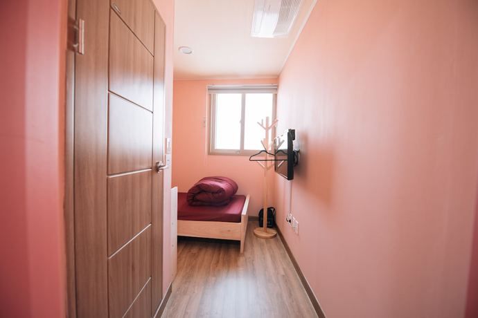 Imagen de la habitación del Hotel Midtown Hostel. Foto 7