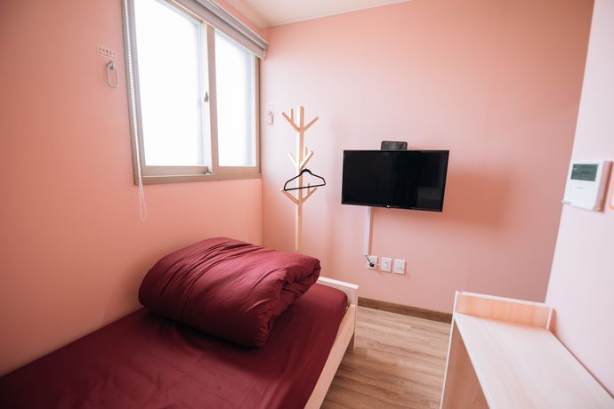 Imagen de la habitación del Hotel Midtown Hostel. Foto 9