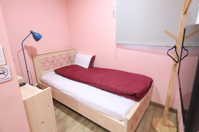 Imagen de la habitación del Hotel Midtown Hostel. Foto 19