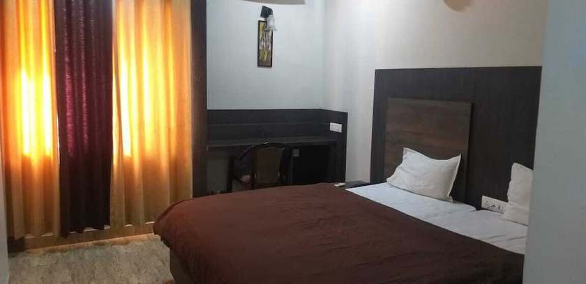 Imagen de la habitación del Hotel Midtown, Jabalpur. Foto 3