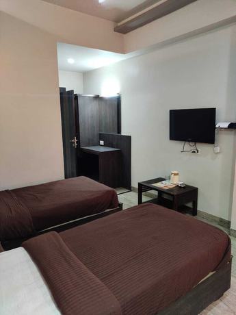 Imagen de la habitación del Hotel Midtown, Jabalpur. Foto 4