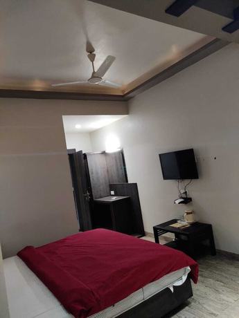Imagen de la habitación del Hotel Midtown, Jabalpur. Foto 9