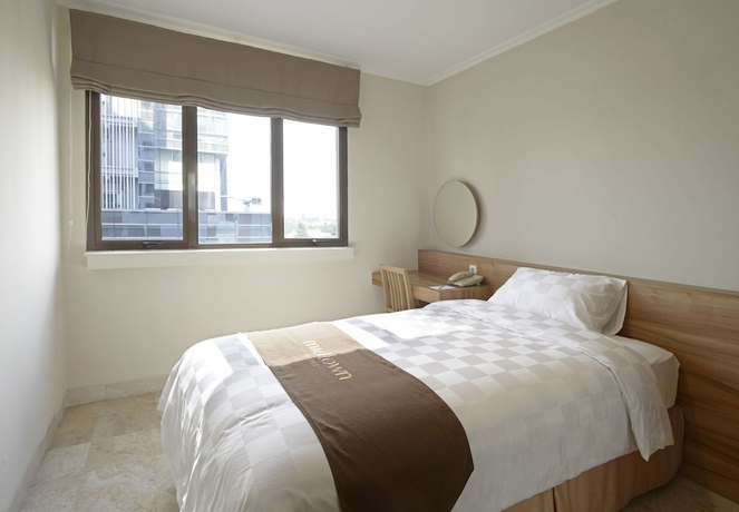 Imagen de la habitación del Hotel Midtown Residence Simatupang - Jakarta. Foto 12
