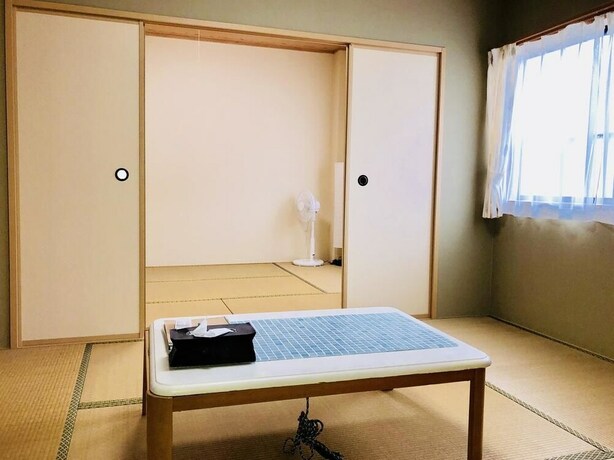 Imagen de la habitación del Hotel Midtown Sakura Apartment House 202. Foto 24