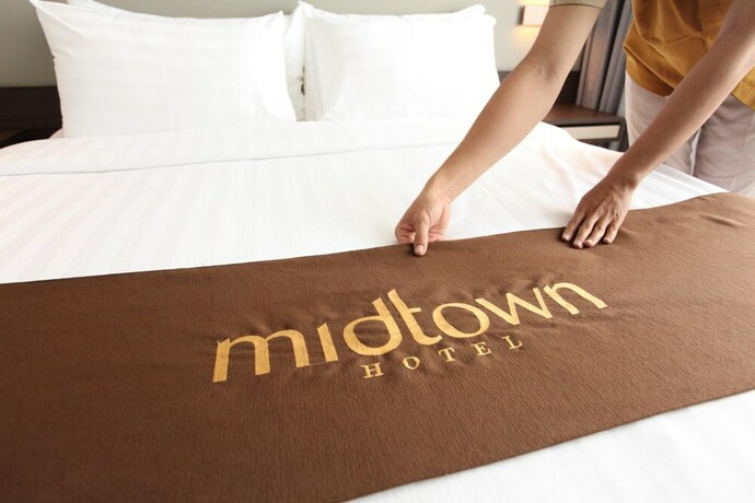 Imagen de la habitación del Hotel Midtown Samarinda. Foto 11