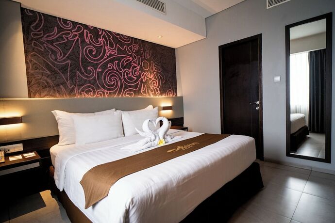 Imagen de la habitación del Hotel Midtown Samarinda. Foto 18