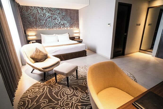 Imagen de la habitación del Hotel Midtown Samarinda. Foto 22