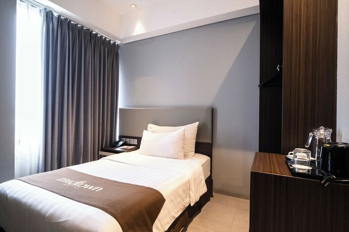 Imagen de la habitación del Hotel Midtown Samarinda. Foto 24