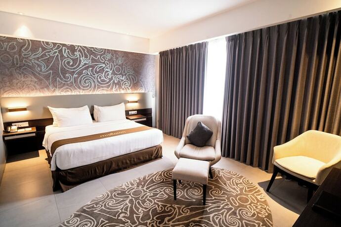 Imagen de la habitación del Hotel Midtown Samarinda. Foto 28