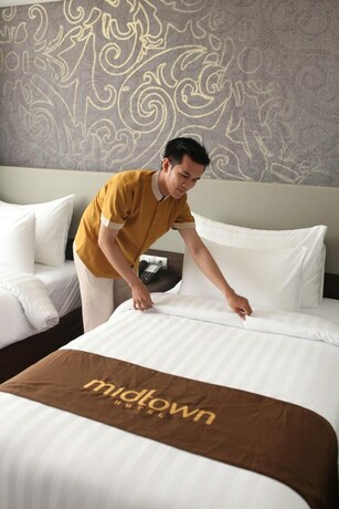 Imagen de la habitación del Hotel Midtown Samarinda. Foto 30