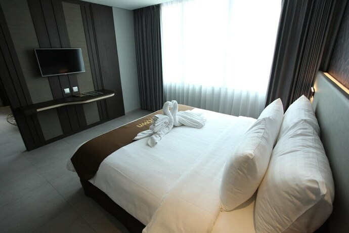 Imagen de la habitación del Hotel Midtown Samarinda. Foto 32