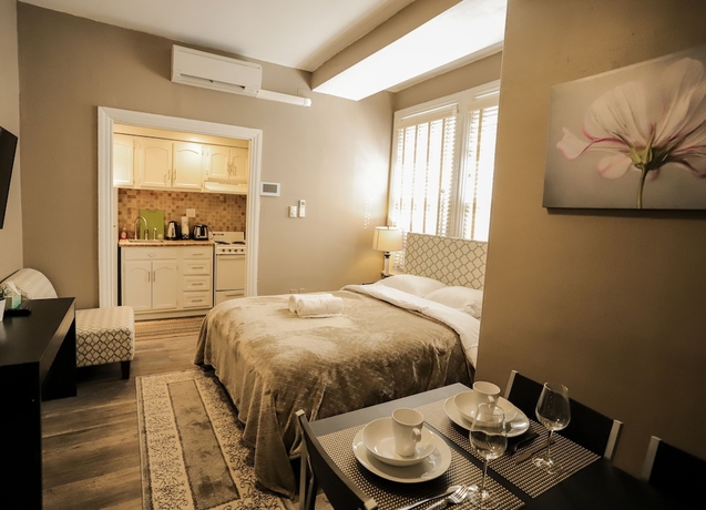 Imagen de la habitación del Hotel Midtown Suites. Foto 8