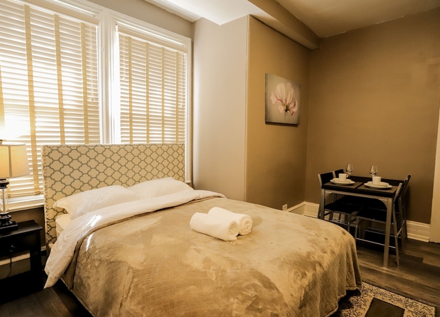 Imagen de la habitación del Hotel Midtown Suites. Foto 10