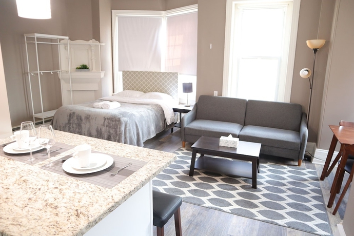 Imagen de la habitación del Hotel Midtown Suites. Foto 13