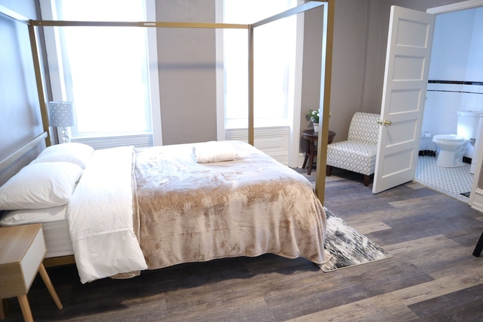 Imagen de la habitación del Hotel Midtown Suites. Foto 15