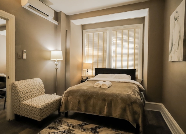 Imagen de la habitación del Hotel Midtown Suites. Foto 17