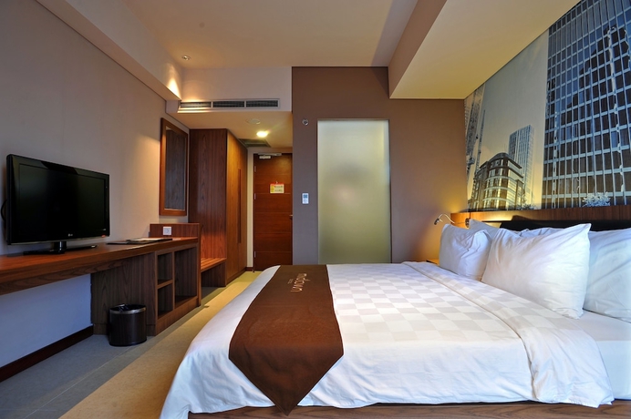 Imagen de la habitación del Hotel Midtown, Surabaya. Foto 5