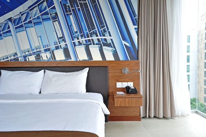 Imagen de la habitación del Hotel Midtown, Surabaya. Foto 7