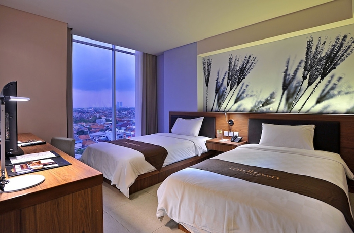 Imagen de la habitación del Hotel Midtown, Surabaya. Foto 9